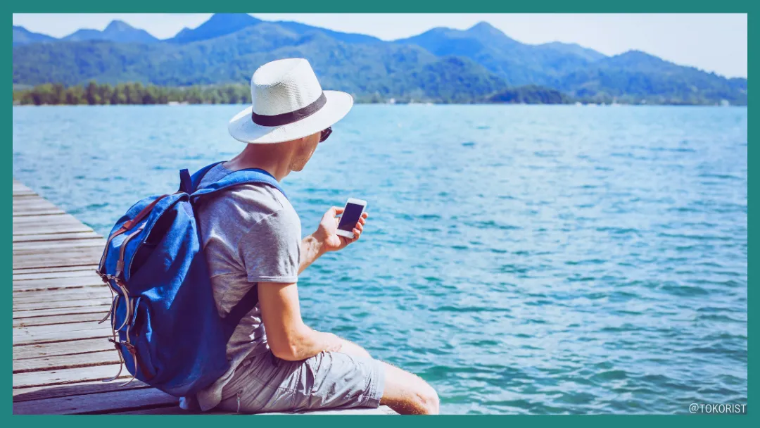 スマホの翻訳アプリを使って海外で会話するイメージ